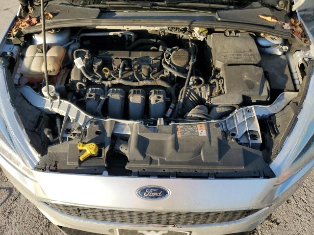 Photo 11 from auction – 2015 FORD FOCUS SE with VIN 1FADP3F21FL206464