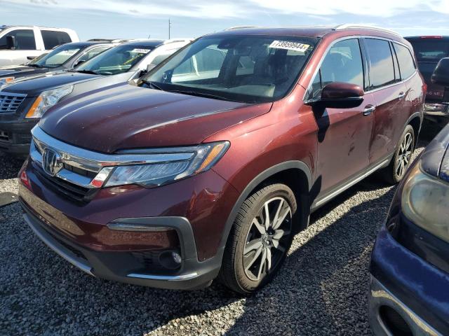 HONDA PILOT TOUR 2021 with VIN 5FNYF6H90MB088918 - Photo from auction