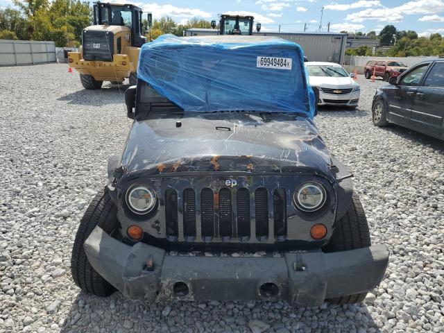Photo 5 from auction – 2013 JEEP WRANGLER U with VIN 1C4BJWDG8DL682078