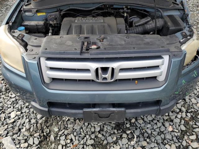 Photo 12 from auction – 2006 HONDA PILOT EX with VIN 5FNYF28556B004908