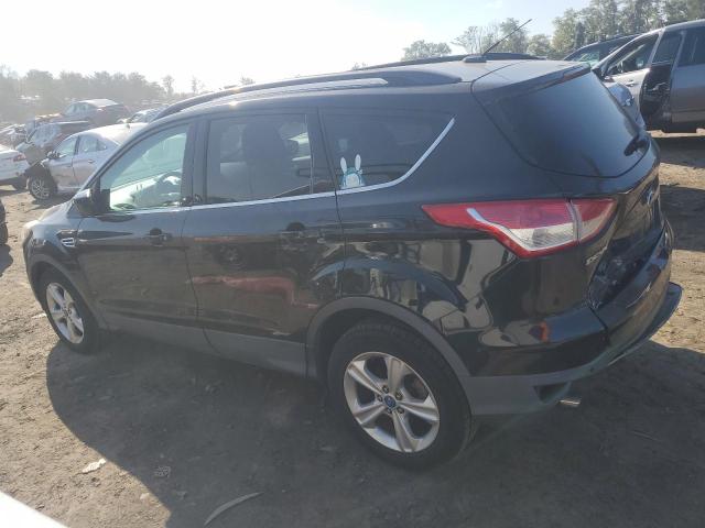 Photo 2 from auction – 2014 FORD ESCAPE SE with VIN 1FMCU9GX5EUA59890