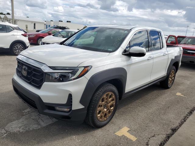 HONDA RIDGELINE 2022 z numerem VIN 5FPYK3F76NB013189 - Zdjęcie z aukcji