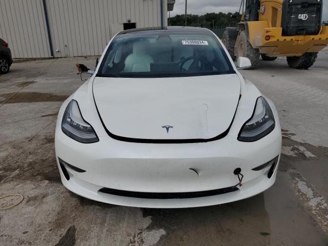 Photo 5 from auction – 2020 TESLA MODEL 3 with VIN 5YJ3E1EA6LF709947