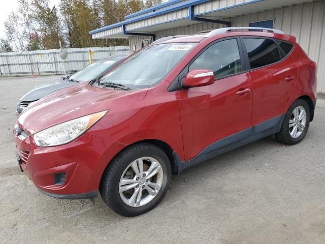 HYUNDAI TUCSON GLS 2012 with VIN KM8JUCAC2CU479999 - Photo from auction