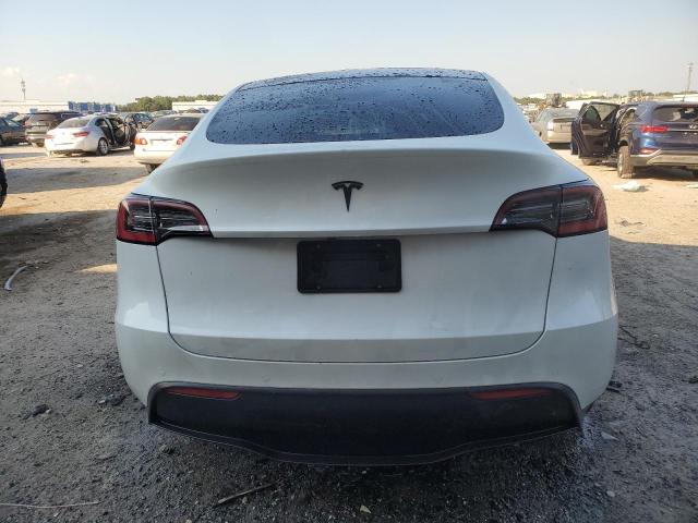 Photo 6 from auction – 2021 TESLA MODEL Y with VIN 5YJYGDEE2MF065594