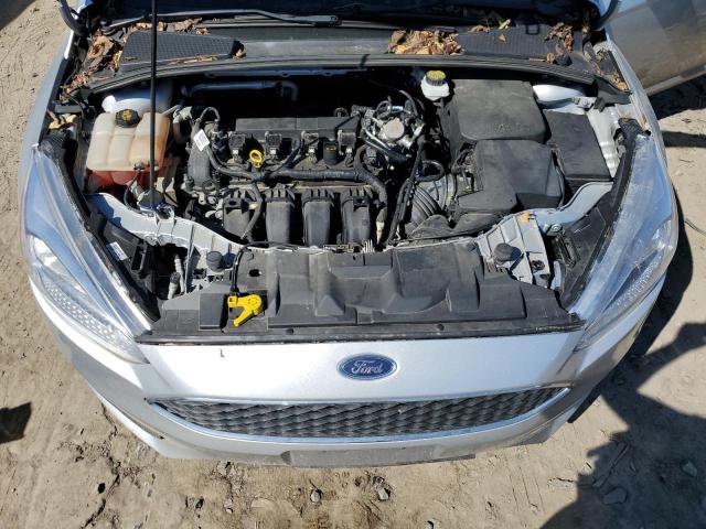 Photo 11 from auction – 2018 FORD FOCUS S with VIN 1FADP3E2XJL320750
