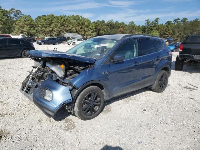 FORD ESCAPE SE 2018 with VIN 1FMCU9GDXJUC03062 - Photo from auction