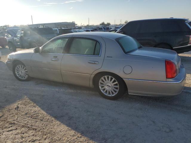 Photo 2 from auction – 2004 LINCOLN TOWN CAR E with VIN 1LNHM81W74Y629461