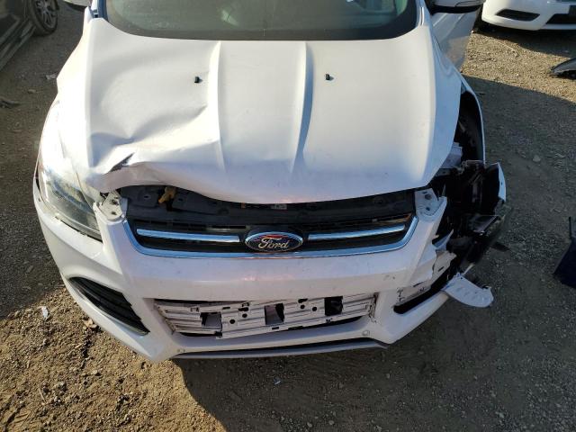 Photo 11 from auction – 2014 FORD ESCAPE TIT with VIN 1FMCU9J9XEUB13386