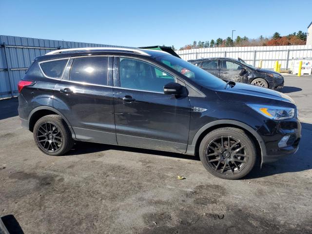 Photo 4 from auction – 2019 FORD ESCAPE TIT with VIN 1FMCU9J99KUC28556