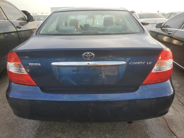 Photo 6 from auction – 2002 TOYOTA CAMRY LE with VIN JTDBE32K920027713