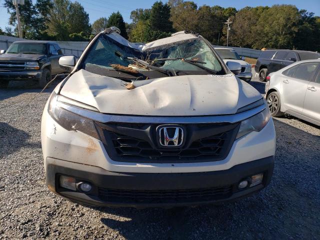 Photo 5 from auction – 2017 HONDA RIDGELINE with VIN 5FPYK3F50HB011912