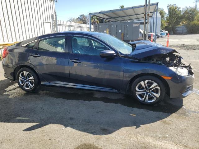 Photo 4 from auction – 2018 HONDA CIVIC LX with VIN 2HGFC2F51JH520237