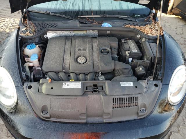 Photo 11 from auction – 2013 VOLKSWAGEN BEETLE with VIN 3VWJP7AT4DM686772