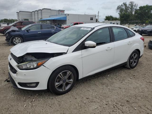 FORD FOCUS SE 2017 with VIN 1FADP3FEXHL253103 - Photo from auction