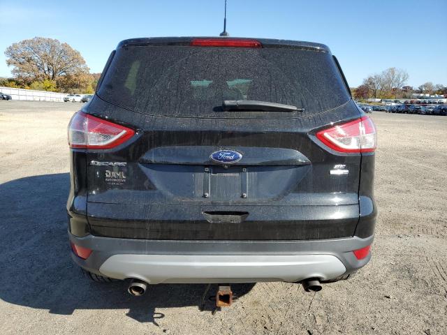Photo 6 from auction – 2014 FORD ESCAPE SE with VIN 1FMCU9GX9EUC83809