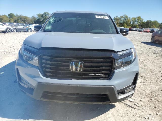 Photo 5 from auction – 2023 HONDA RIDGELINE with VIN 5FPYK3F88PB040972