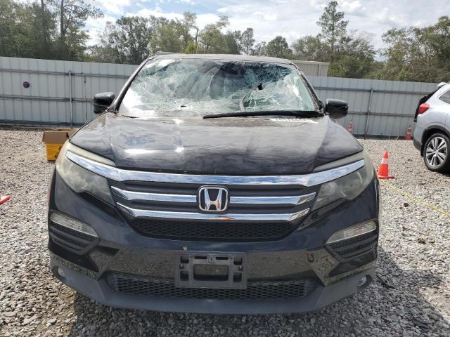 Photo 5 from auction – 2016 HONDA PILOT EXLN with VIN 5FNYF5H71GB033732