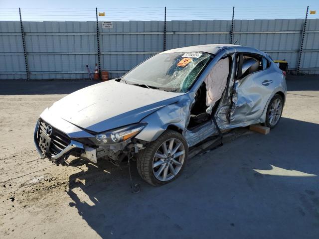 MAZDA 3 TOURING 2017 with VIN JM1BN1L32H1149666 - Photo from auction