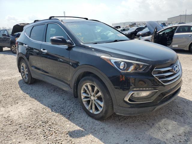 Photo 4 from auction – 2018 HYUNDAI SANTA FE S with VIN 5NMZU4LA8JH083086