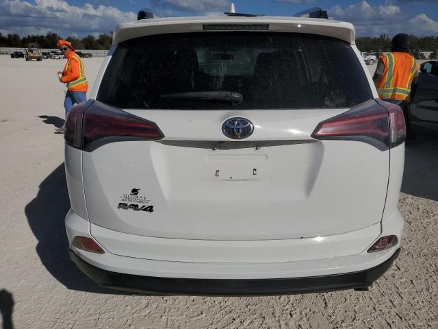 Photo 6 from auction – 2016 TOYOTA RAV4 LE with VIN JTMZFREV3GJ067436