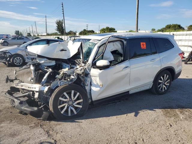 HONDA PILOT EXL 2022 with VIN 5FNYF5H53NB006009 - Photo from auction