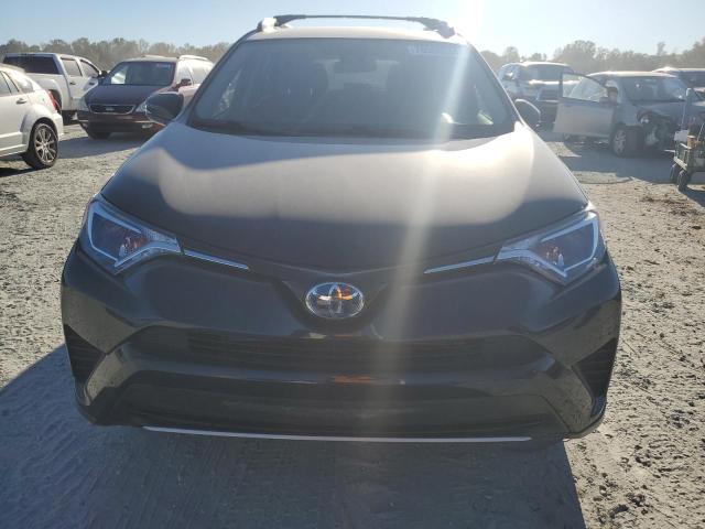 Photo 5 from auction – 2018 TOYOTA RAV4 with VIN JTMRJREV7JD177037