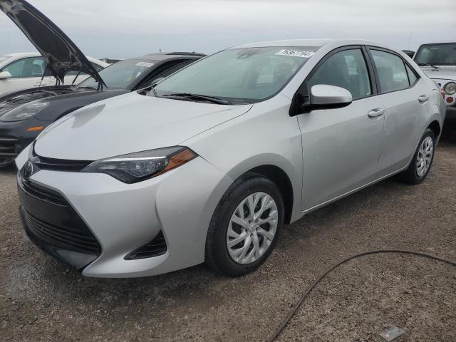 TOYOTA COROLLA L 2019 with VIN 5YFBURHE1KP866073 - Photo from auction
