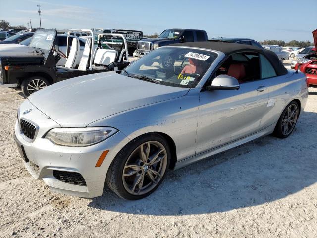 BMW M235I 2015 with VIN WBA1M1C52FVZ99476 - Photo from auction
