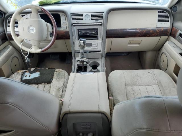 Photo 8 from auction – 2004 LINCOLN NAVIGATOR with VIN 5LMFU27RX4LJ43162