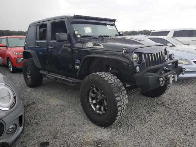 Photo 4 from auction – 2014 JEEP WRANGLER U with VIN 1C4BJWDGXEL231896