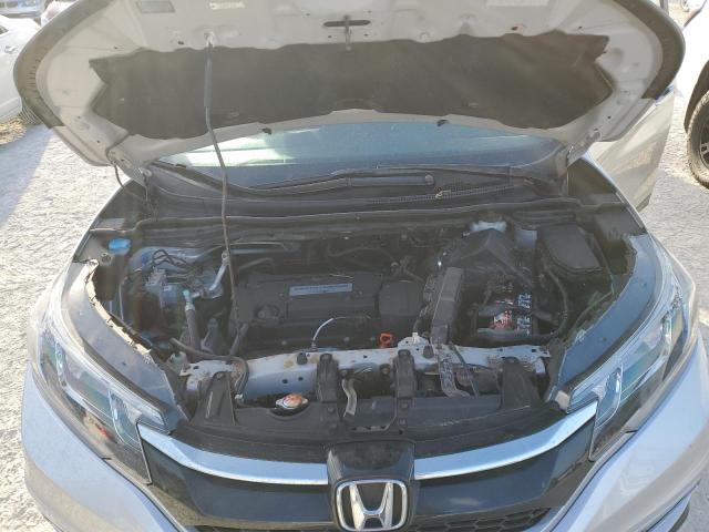 Photo 12 from auction – 2015 HONDA CR-V EX with VIN 2HKRM4H52FH640757