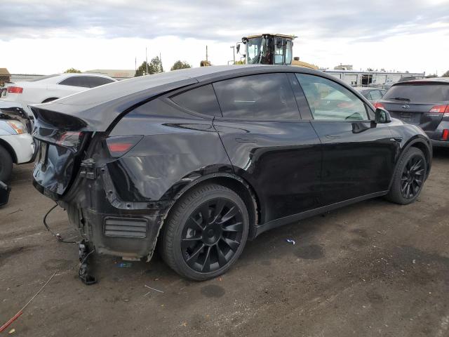 Photo 3 from auction – 2022 TESLA MODEL Y with VIN 7SAYGAEE7NF573563