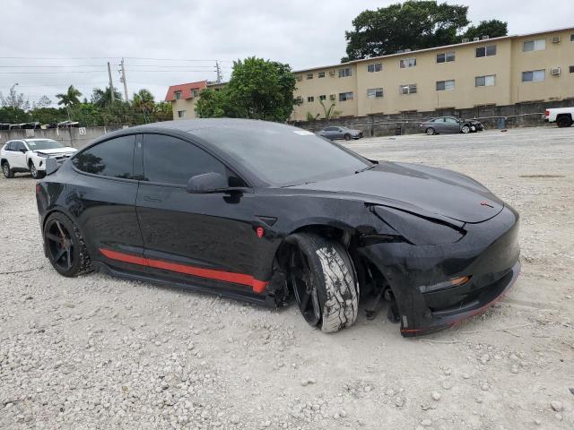 Photo 4 from auction – 2021 TESLA MODEL 3 with VIN 5YJ3E1EB1MF044157
