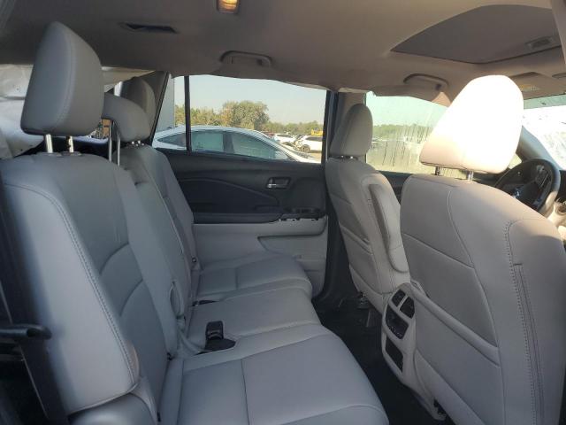 Photo 11 from auction – 2022 HONDA PILOT SE with VIN 5FNYF5H29NB037089