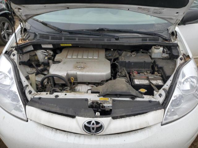 Photo 12 from auction – 2010 TOYOTA SIENNA CE with VIN 5TDKK4CCXAS304449