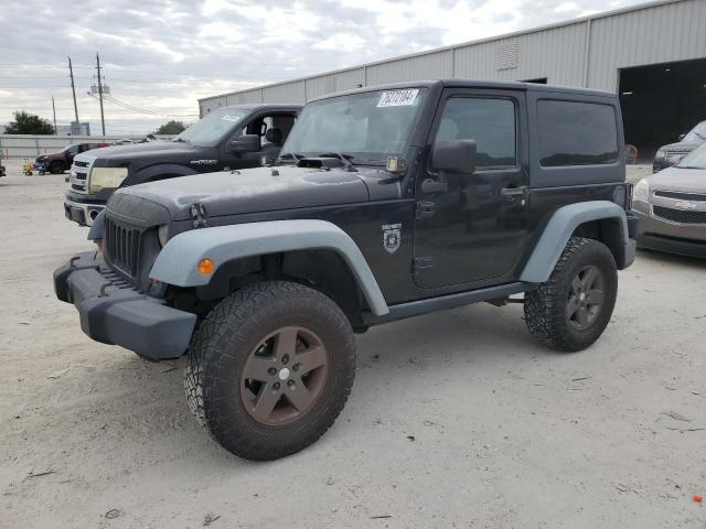 JEEP WRANGLER R 2011 with VIN 1J4BA6D15BL585388 - Photo from auction