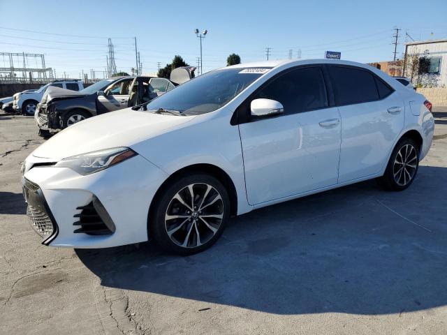 TOYOTA COROLLA L 2017 with VIN 5YFBURHE8HP699459 - Photo from auction