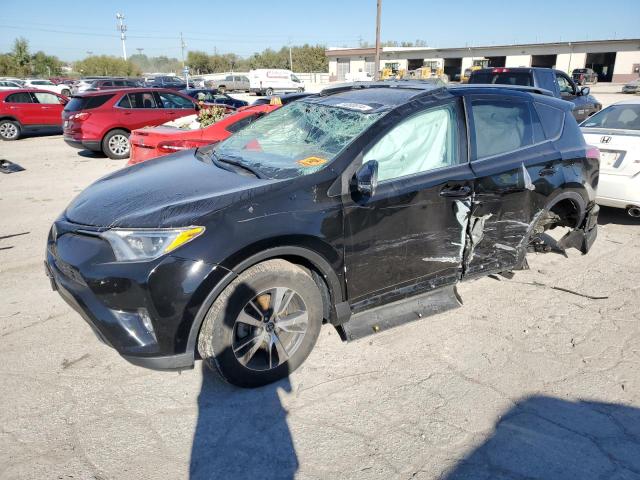 TOYOTA RAV4 XLE 2018 with VIN 2T3RFREV2JW794091 - Photo from auction