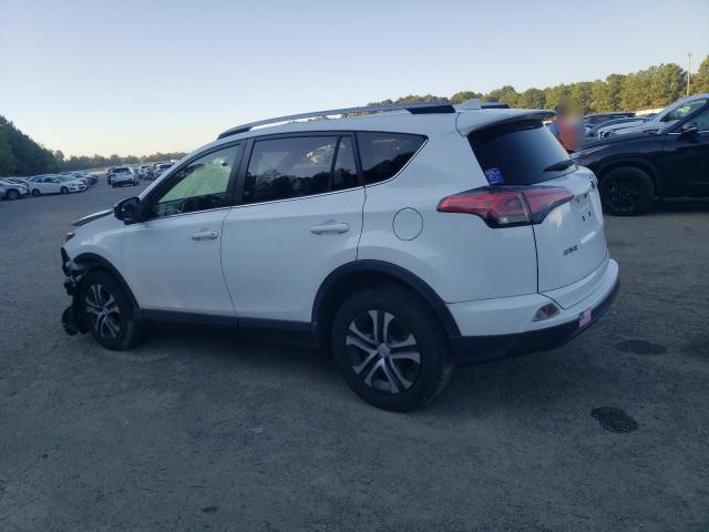 Photo 2 from auction – 2018 TOYOTA RAV4 LE with VIN JTMZFREV0JJ212293
