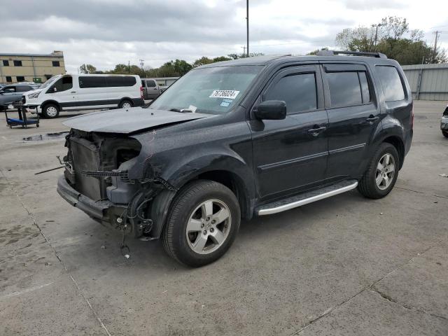 HONDA PILOT EXL 2011 with VIN 5FNYF3H69BB020361 - Photo from auction