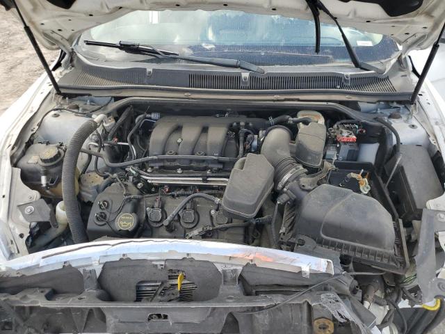 Снимка 11 от търг – 2014 FORD TAURUS SE с VIN 1FAHP2D80EG156151