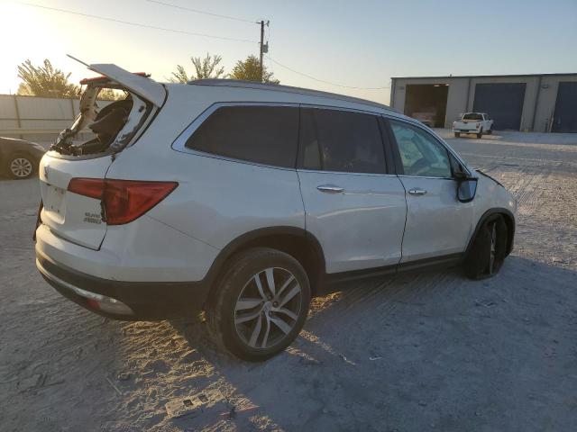 Photo 3 from auction – 2018 HONDA PILOT ELIT with VIN 5FNYF6H04JB049519