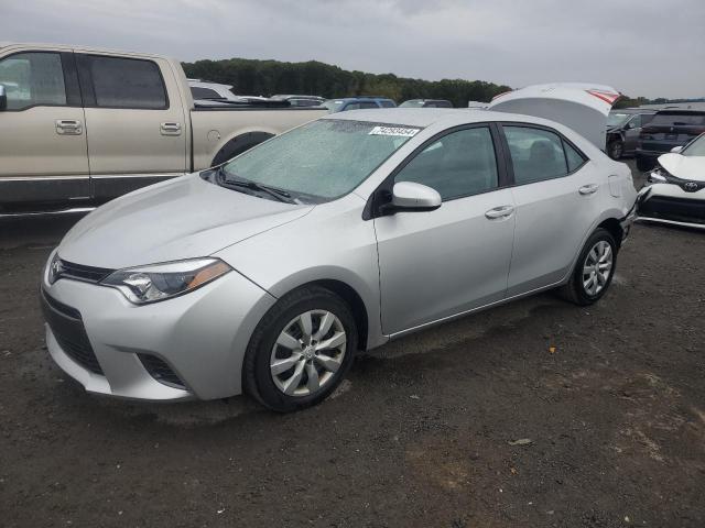 TOYOTA COROLLA L 2016 with VIN 2T1BURHE1GC650036 - Photo from auction