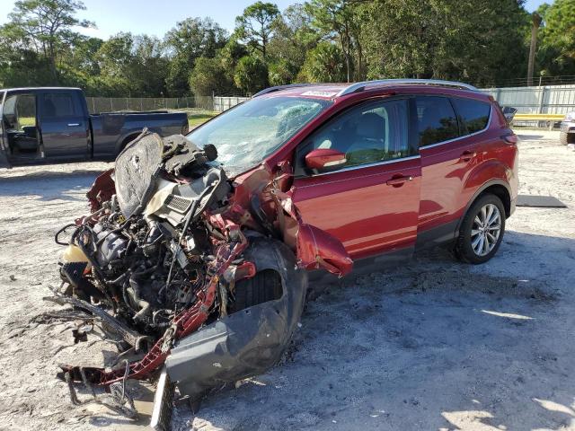 FORD ESCAPE TIT 2017 with VIN 1FMCU0J99HUC64588 - Photo from auction
