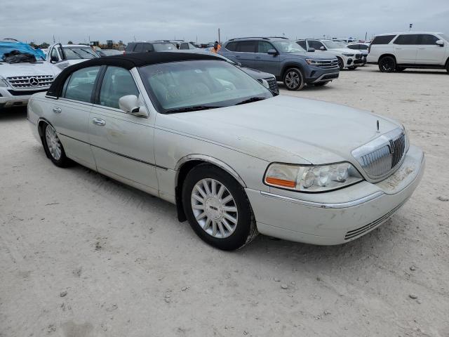 Photo 4 from auction – 2004 LINCOLN TOWN CAR E with VIN 1LNHM81W94Y677804