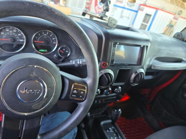 Photo 9 from auction – 2014 JEEP WRANGLER U with VIN 1C4BJWDG8EL109621