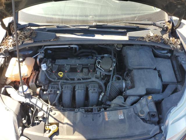Photo 11 from auction – 2014 FORD FOCUS SE with VIN 1FADP3F21EL437105