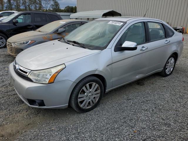 FORD FOCUS SEL 2011 with VIN 1FAHP3HNXBW141700 - Photo from auction