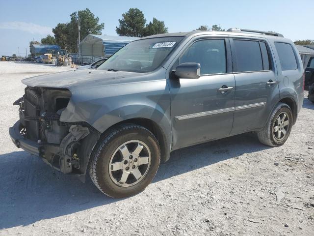 HONDA PILOT TOUR 2011 with VIN 5FNYF3H94BB051608 - Photo from auction